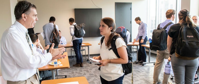 teacher speaking with student 