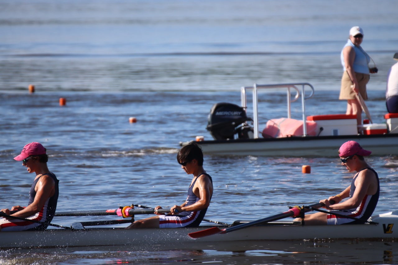 people rowing in kayak