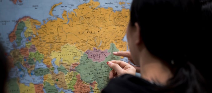 woman using world map 