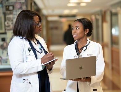 medical students in lab coats 