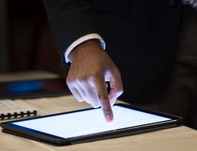 person using tablet 