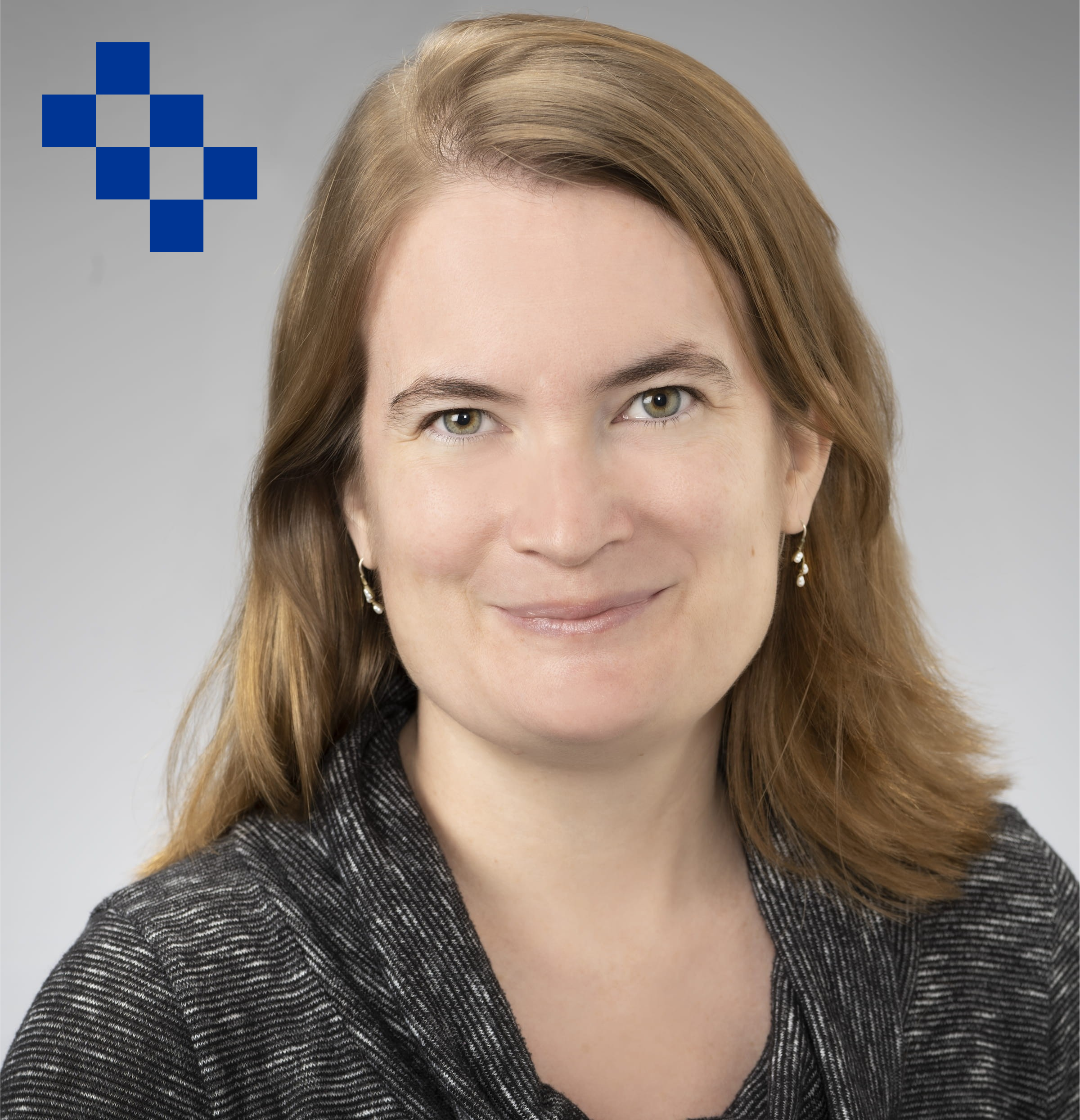 Headshot of Ray with a blue Health Sciences six block logo in the background